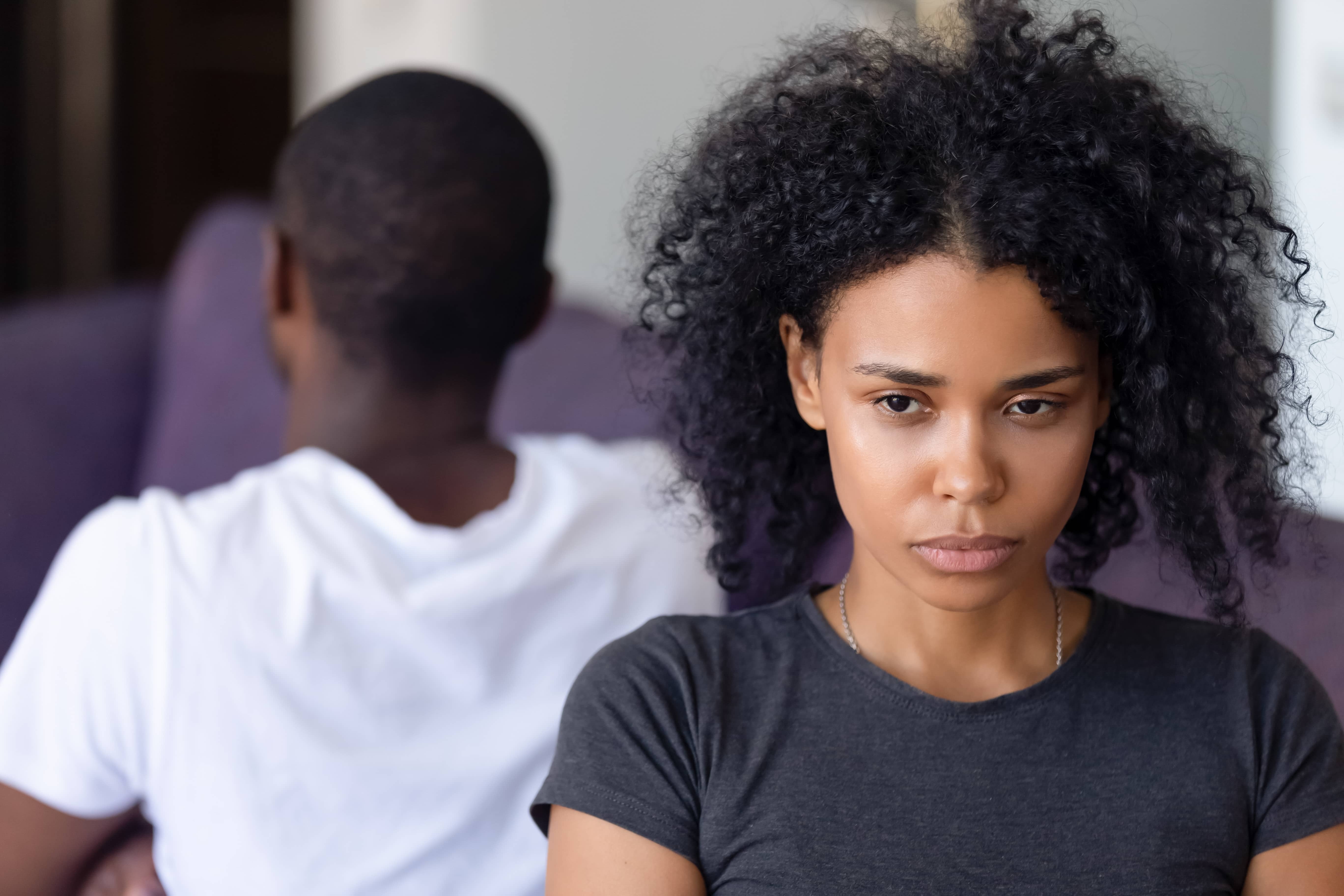 safe quotes: black couple facing away from one another