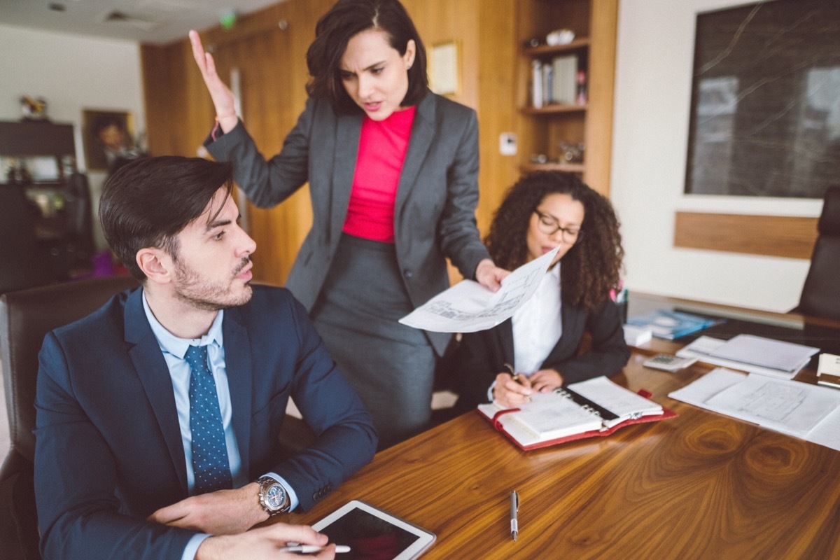 Young businessman being fired at work