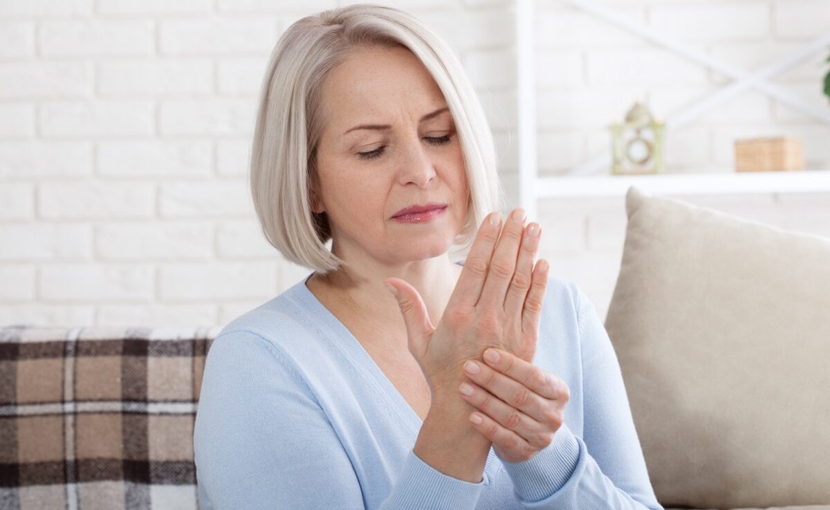 Woman with hand pain