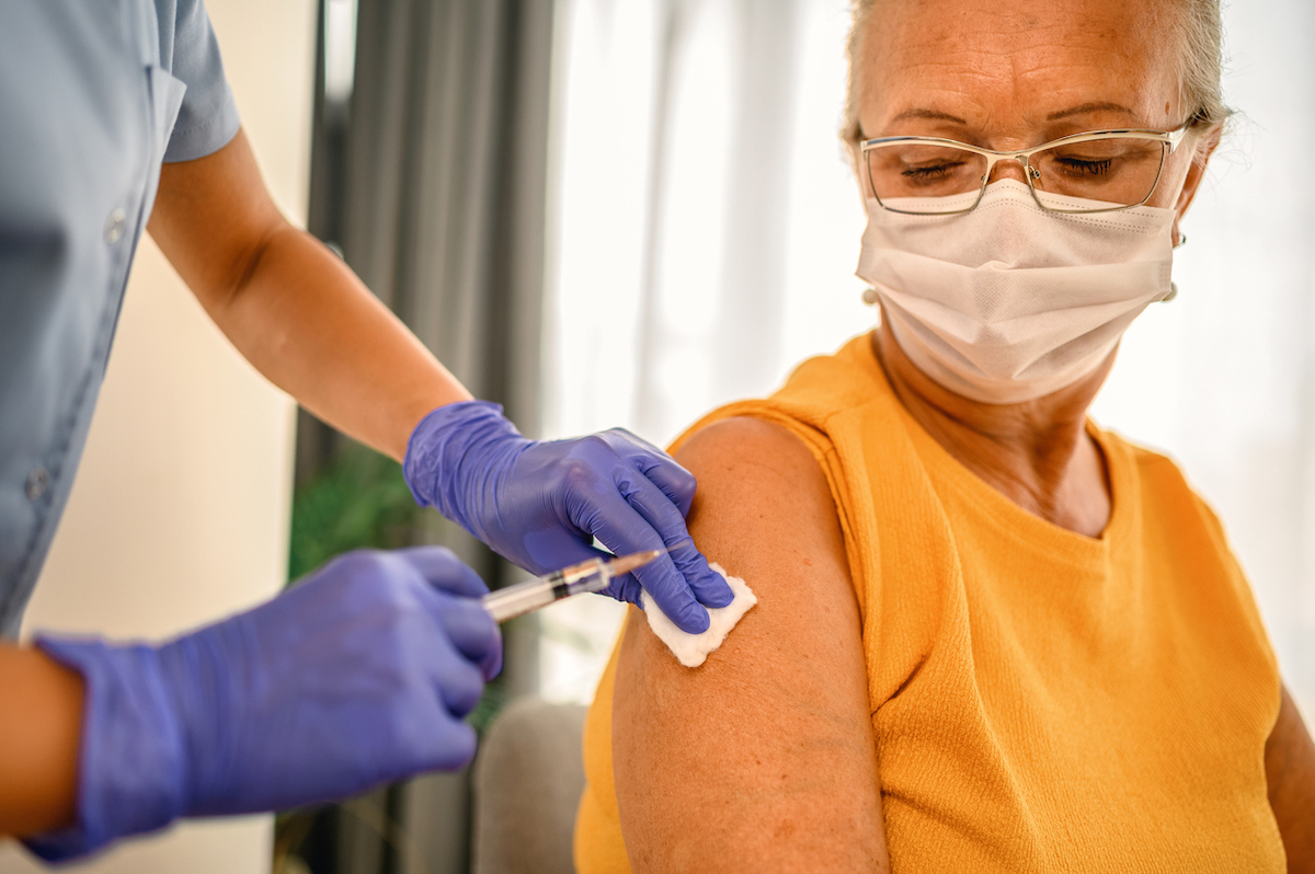 Senior woman is about to receive Covid-19 vaccine