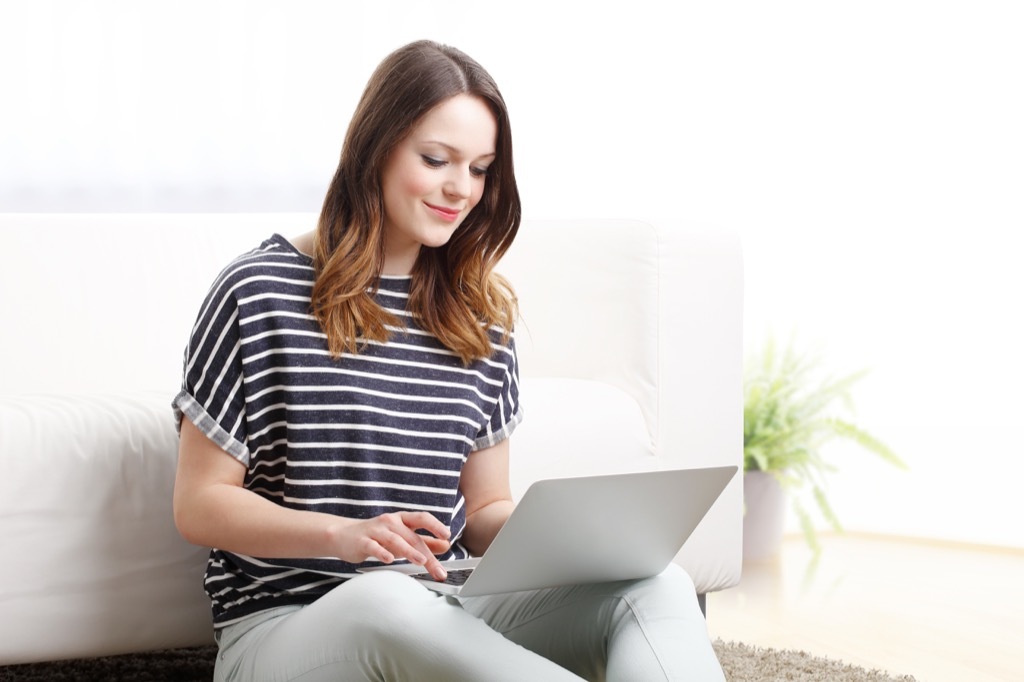 Woman typing on computer