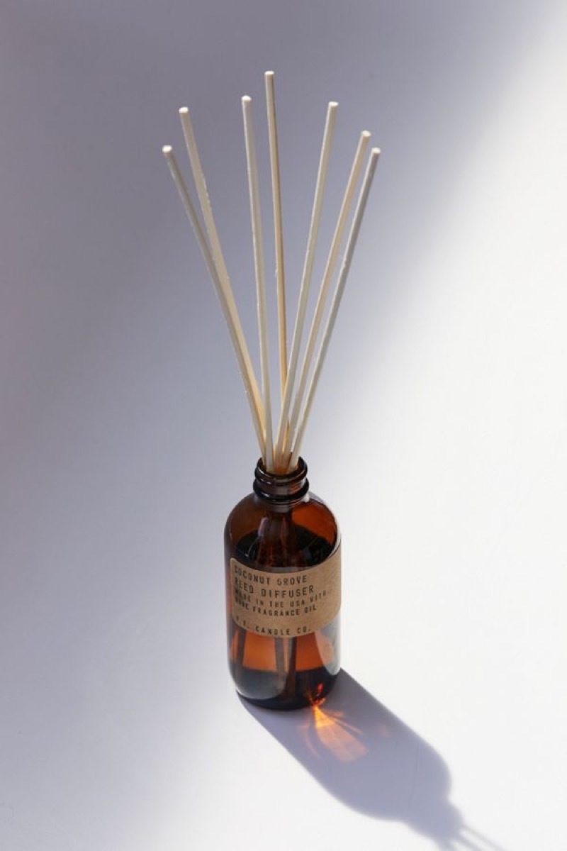 brown bottle with diffusing reeds coming out of the top