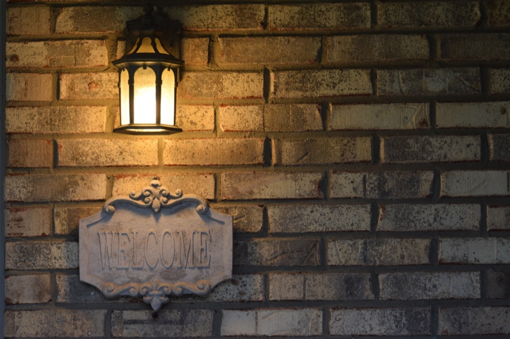 porch light against brick wall Affordable ways to remodel your home