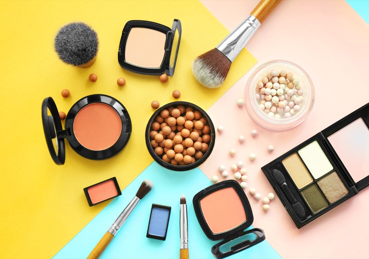 Set of decorative cosmetics on color background