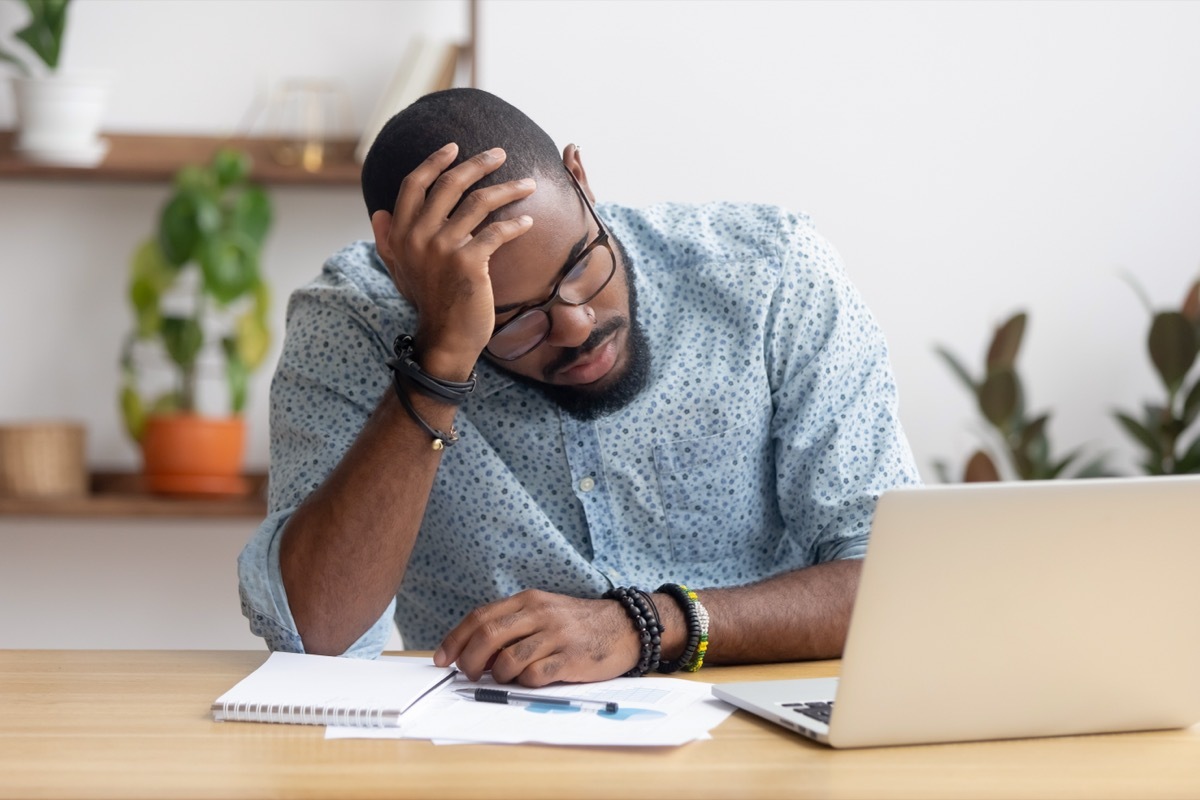 Black Man Struggling During Work Day