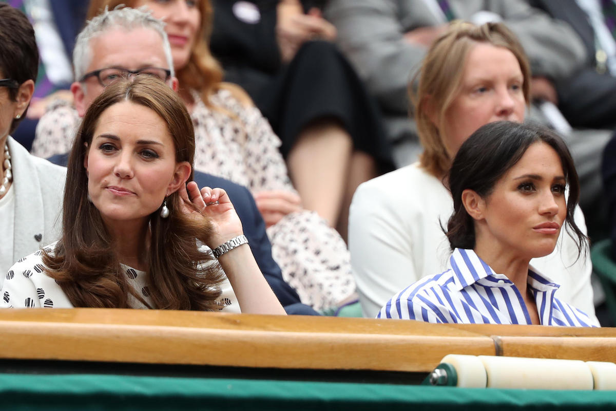 Kate (Catherine Middleton) Duchess of Cambridge and Meghan Markle, Duchess of Sussex at Wimbledon in 2018