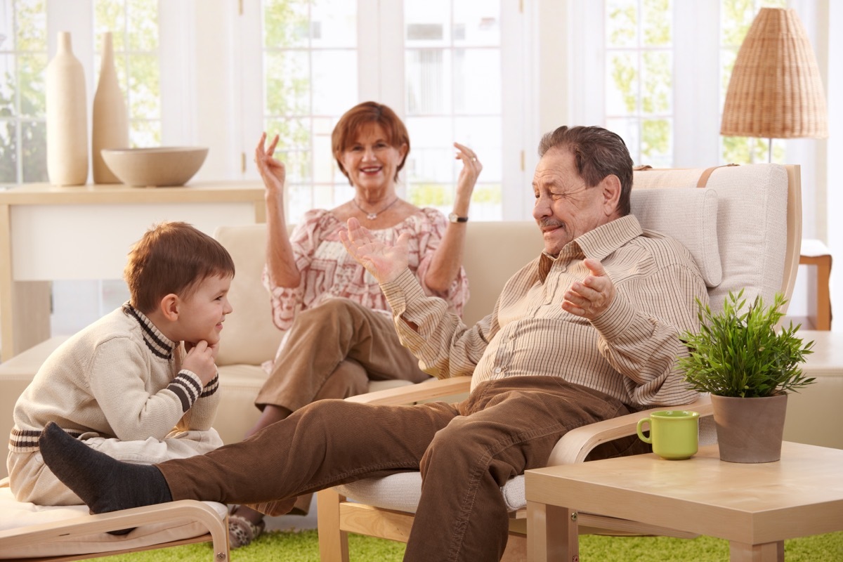 Grandparents telling grandchild a family story