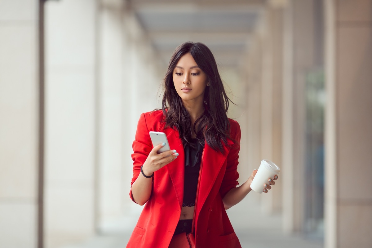 Woman deleting pictures of her ex from social media to help her move on