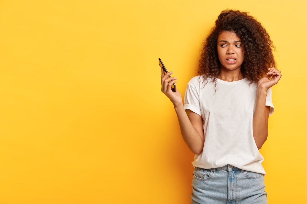 Woman avoiding her phone