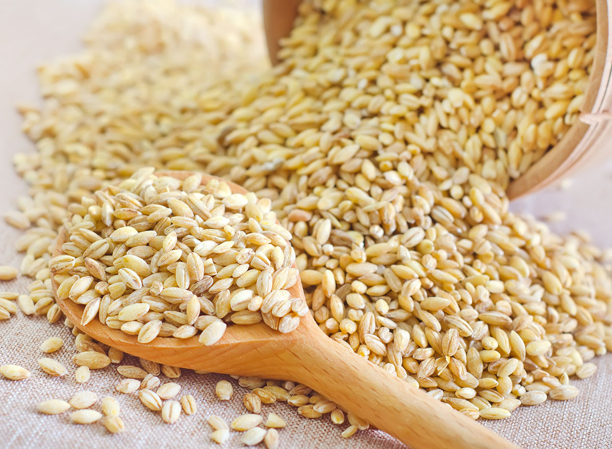 wheat berries in wooden spoon