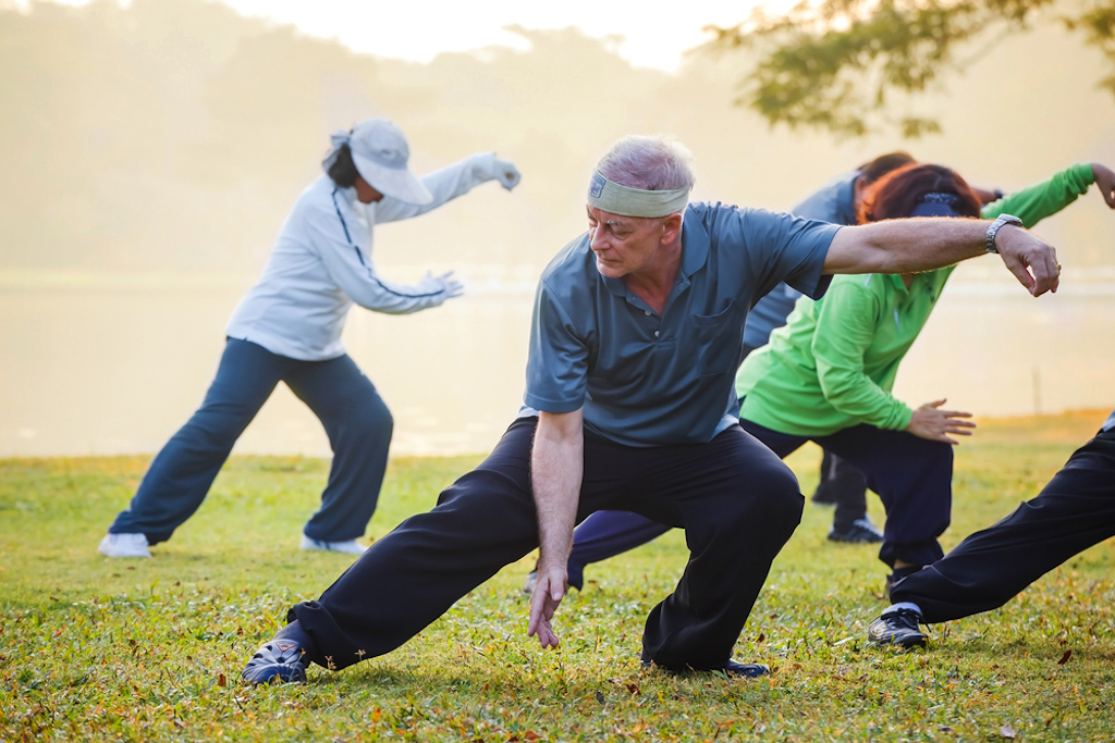 older people practice tai chi