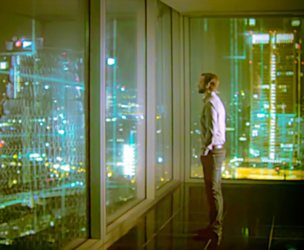 Businessman reflecting out window