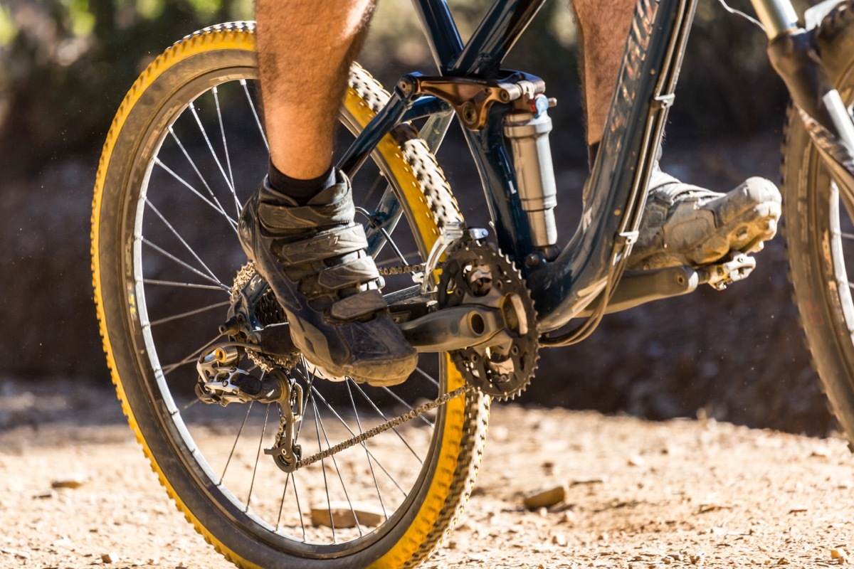 pedaling a mountain bike