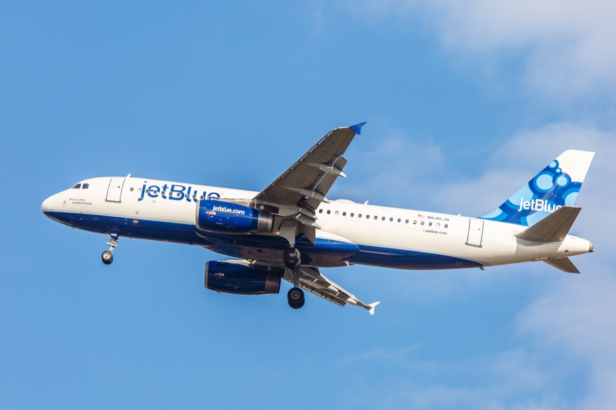 Airbus A320 JetBlue approaches John F. Kennedy International Airport in New York, NY on November 3, 2013. A320 was the first narrow body airliner from Airbus. It is the biggest competition to Boeing 737.