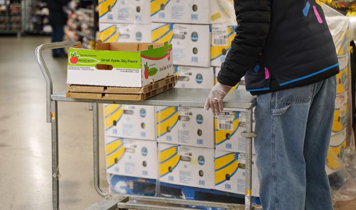 walmart employee with cart