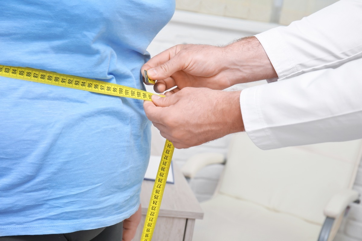 Person with obesity being measured