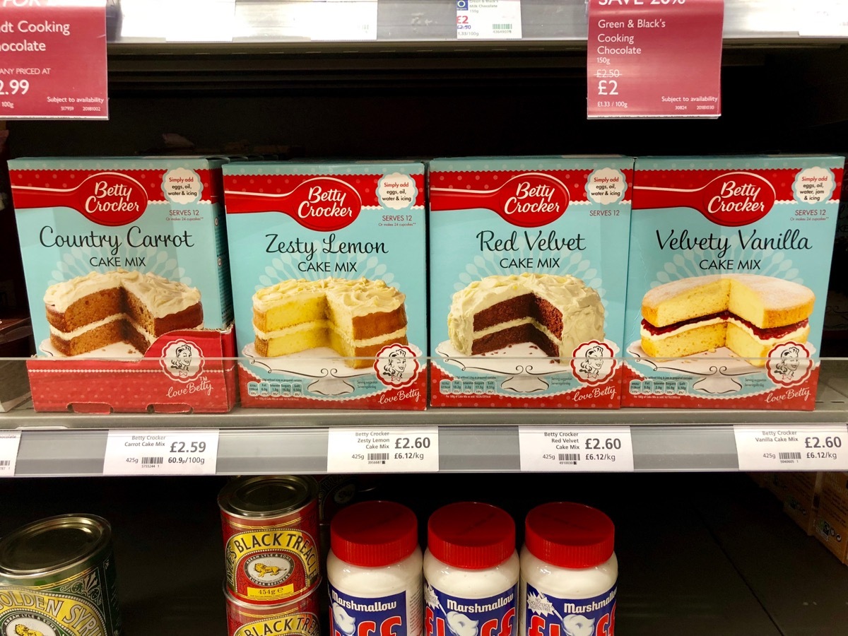 Four Boxes of Cake Mix in a Store