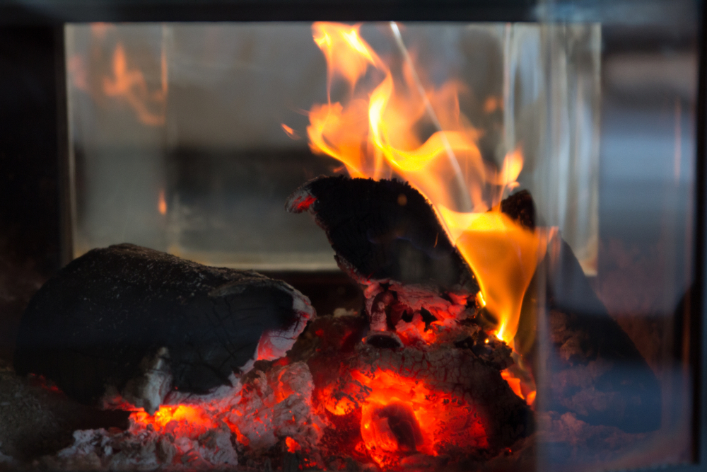 fire behind glass cover