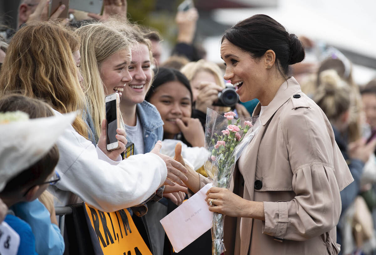 The Duke and Duchess of Sussex meet fans during a public walk along Auckland's Viaduct Harbour during their visit to New Zealand.