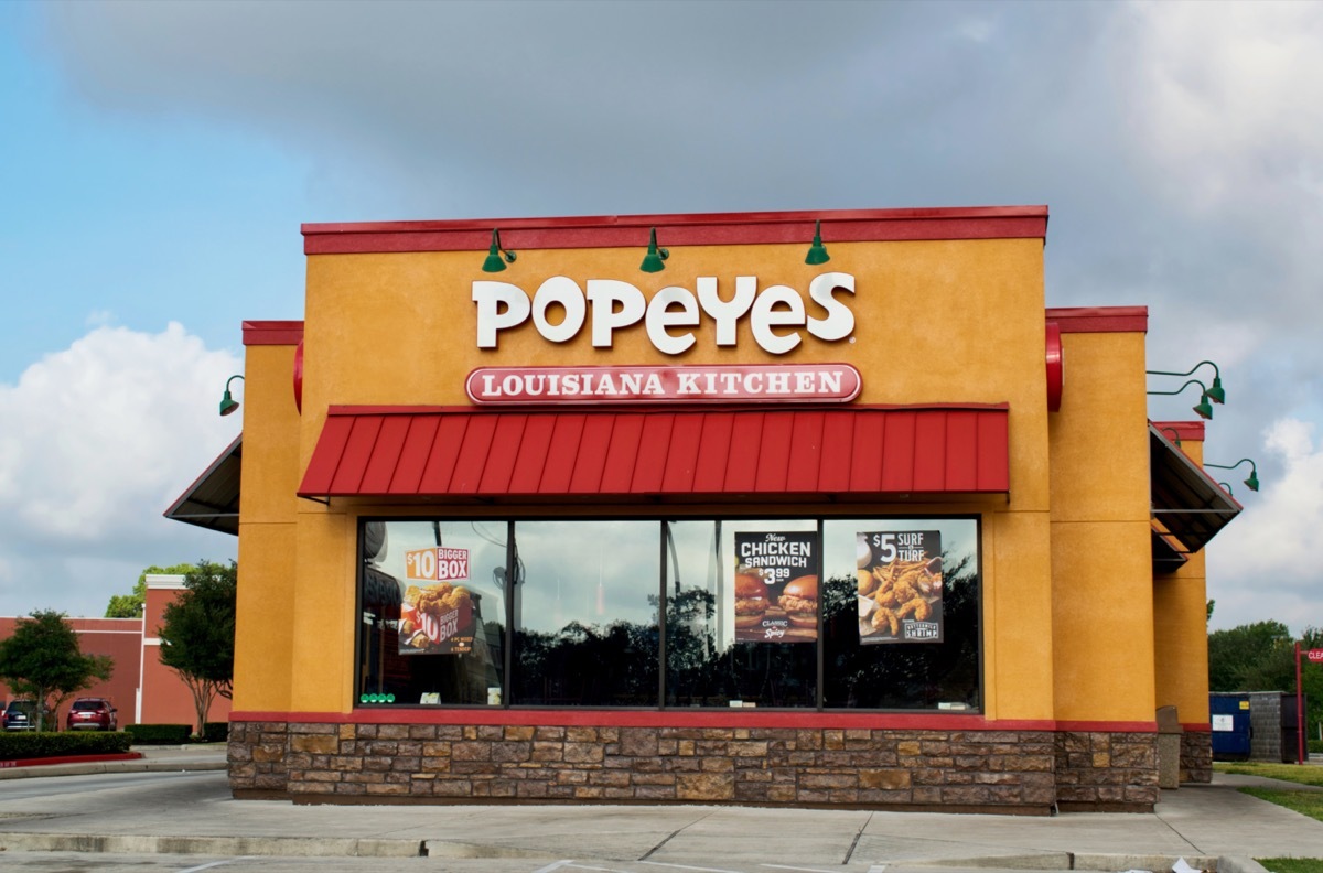 the exterior of a Popeyes restaurant in Houston, Texas