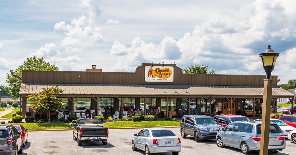 A local Cracker Barrel Restaurant and parking lot. Cracker Barrel Old Country Store, Inc. is an American chain of restaurant and gift stores based on a southern country theme.