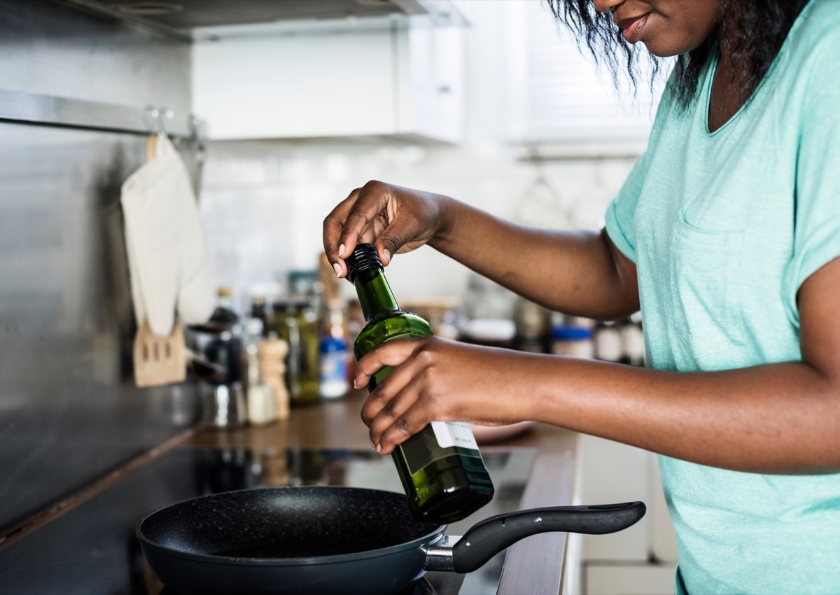 Black woman cooking in the kitchen