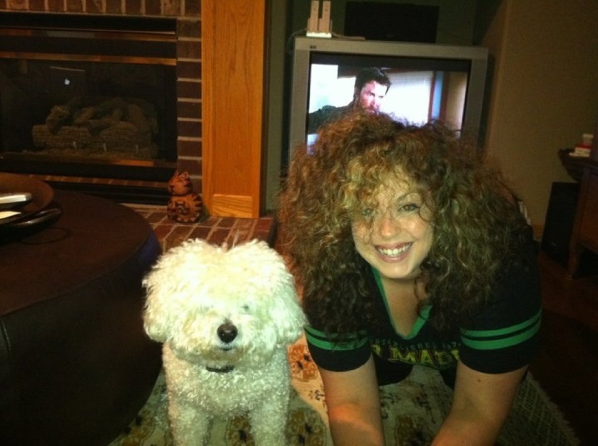 woman with same hairstyle as dog dogs who look like their owners