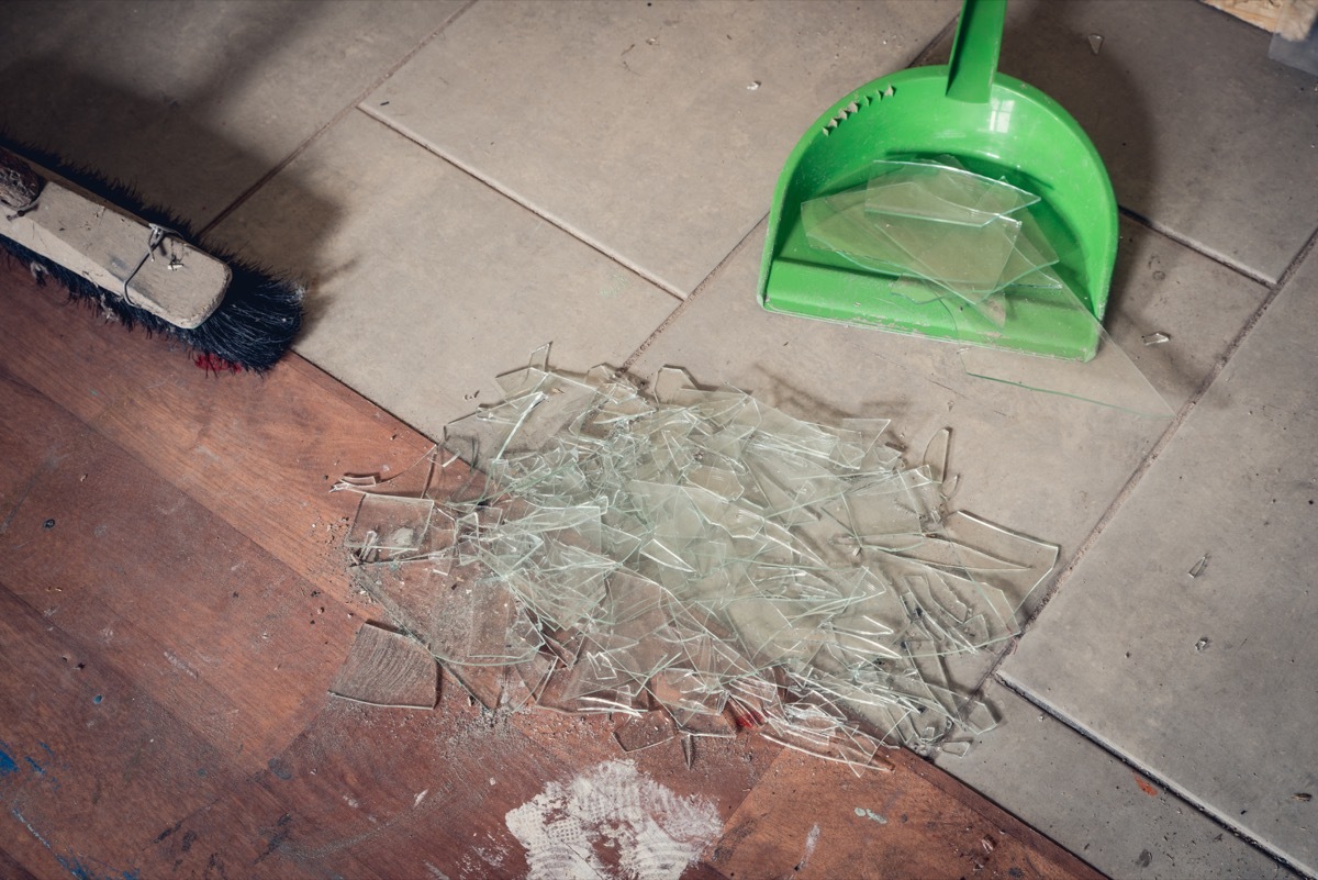 Person Sweeping Up Broken Glass {Get Rid of Old Stuff}