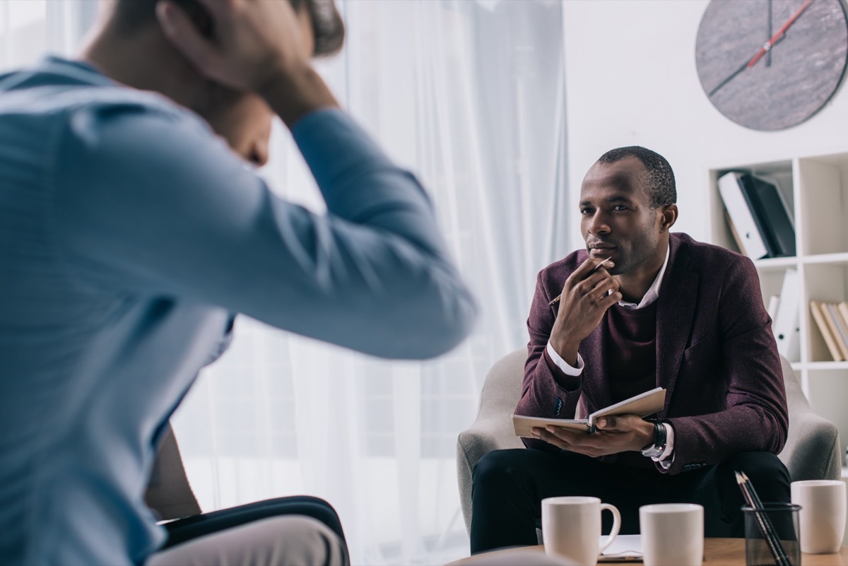 Man talking with a therapist in therapy