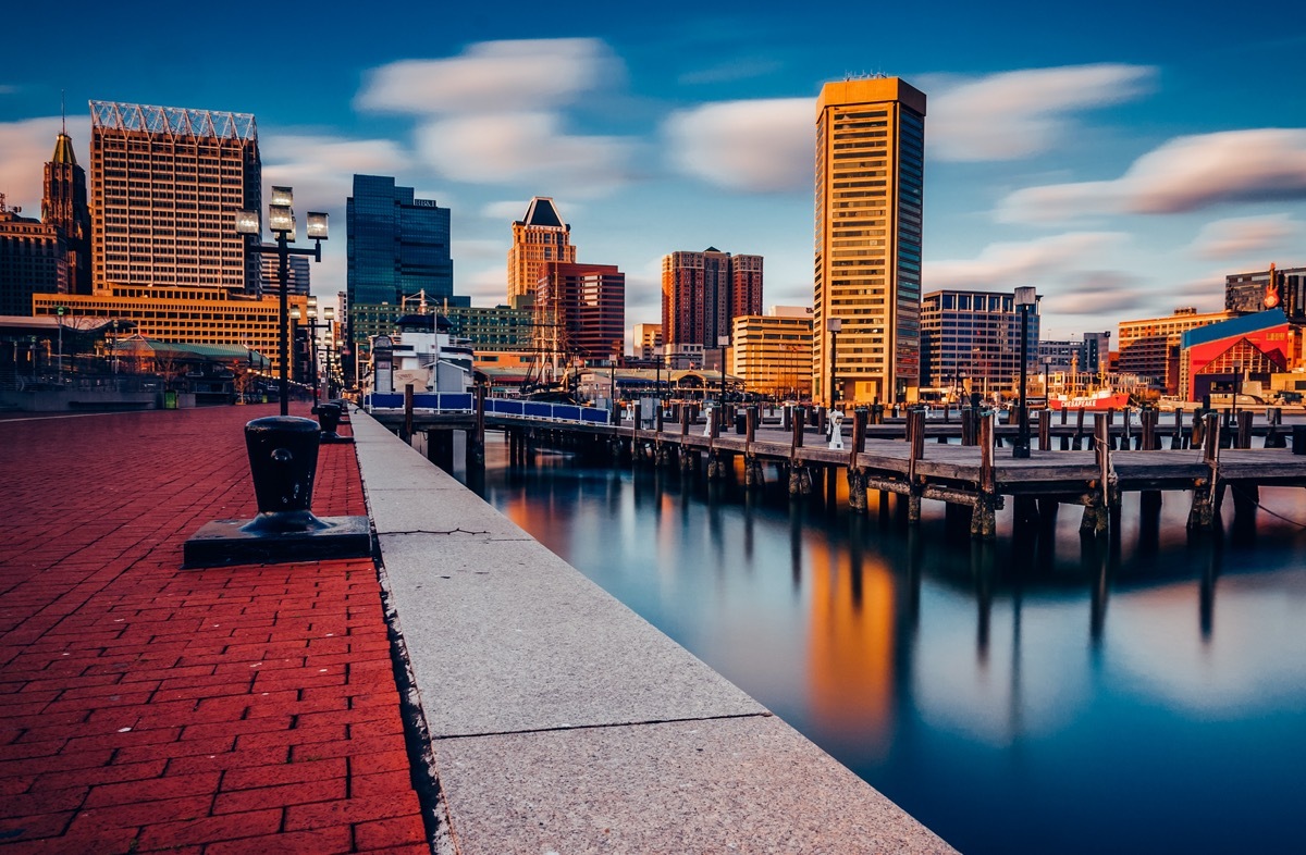 the Baltimore skyline and Inner Harbor Promenade in Baltimore, Maryland