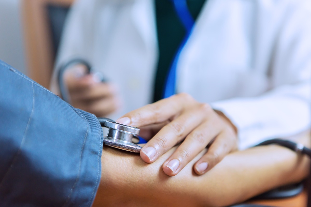 closeup of Dr. taking blood pressure 