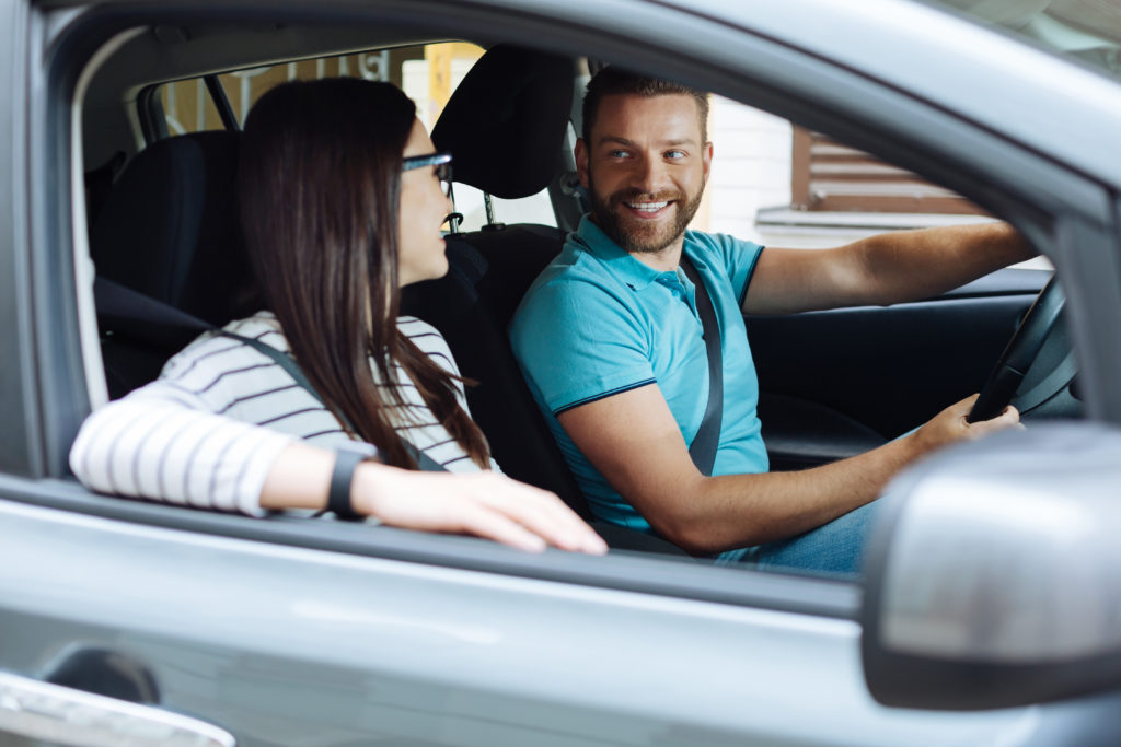 man and woman in car