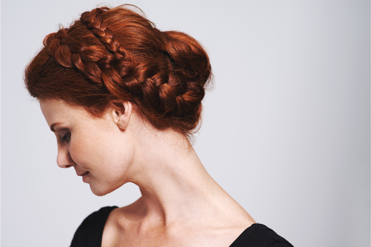 braided updo on redhead woman