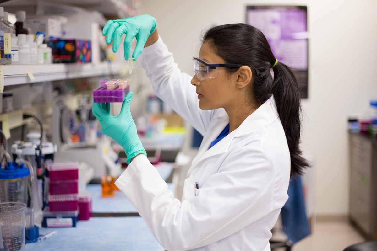 Female doctor doing testing in a lab