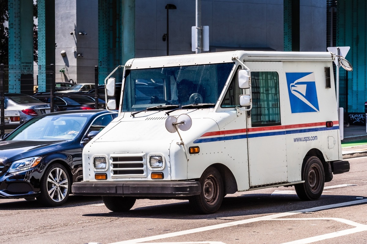 Aug 10, 2019 San Francisco / CA / USA - USPS vehicle making deliveries in San Francisco