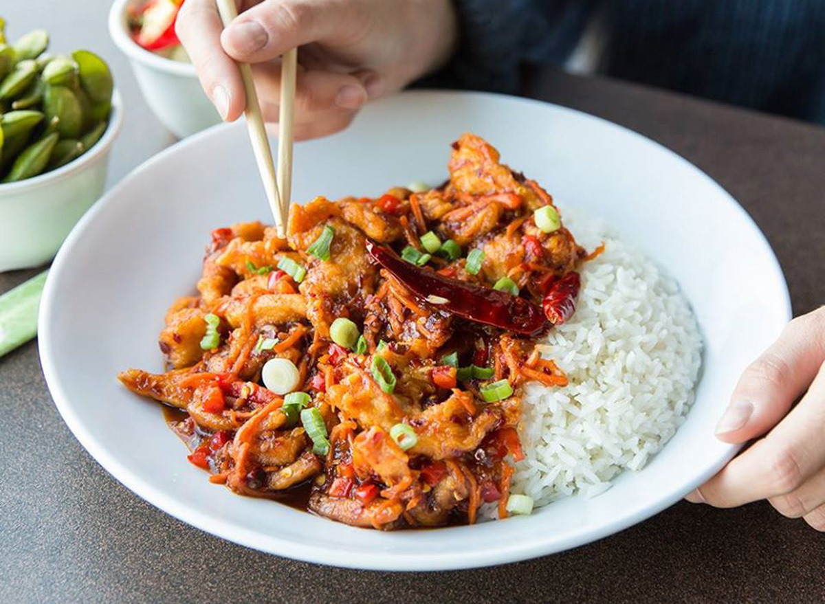 spicy general gso's in a bowl with rice