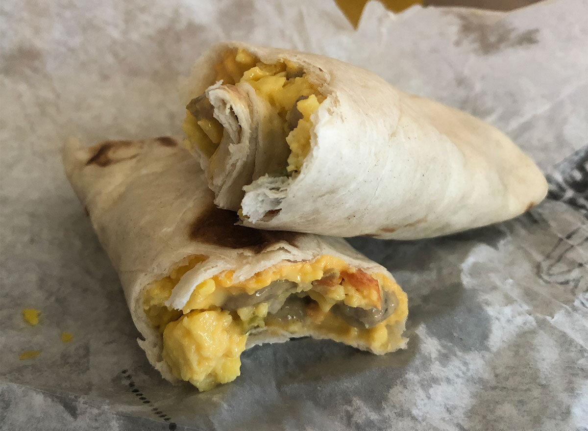 two mcdonalds sausage burritos with bites