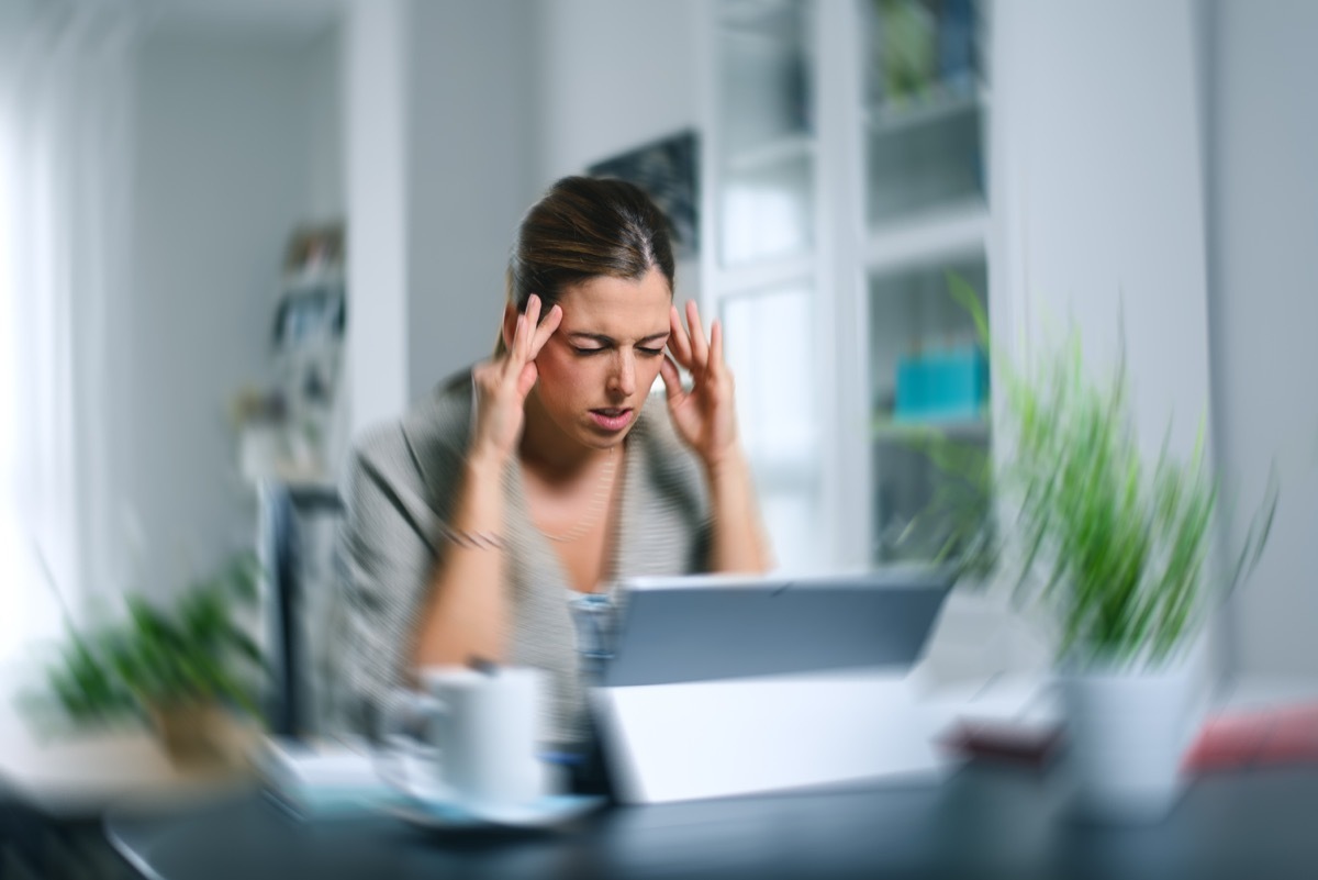 Woman Holding Her Head When Dizzy