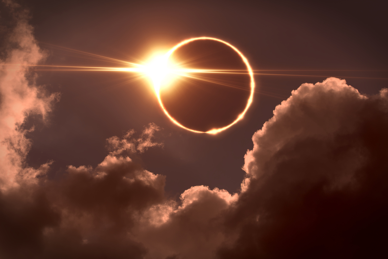 The moon covering the sun during a total solar eclipse with a 