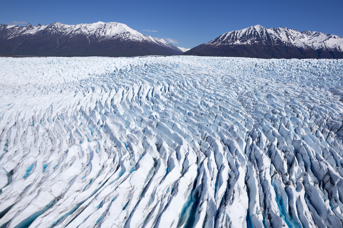 The blue and white ice of the Knik Glacier in Alaska.