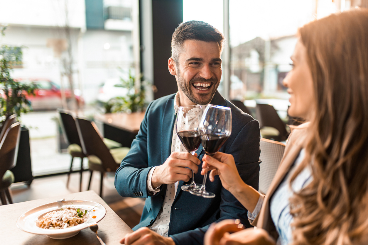 young couple drinking wine together