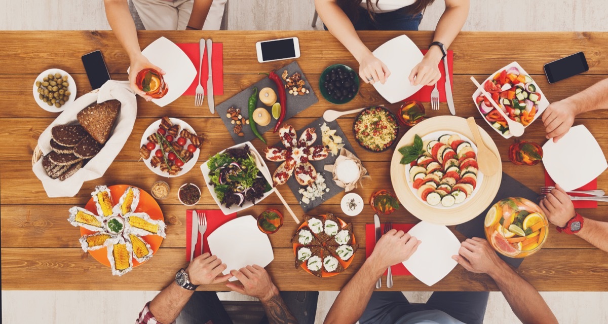 family eating at festive table