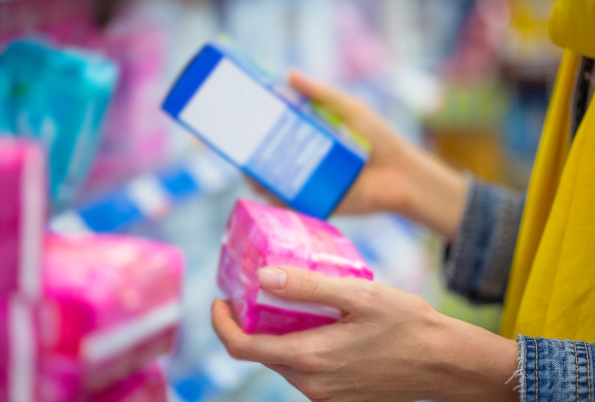 Woman selecting tampon