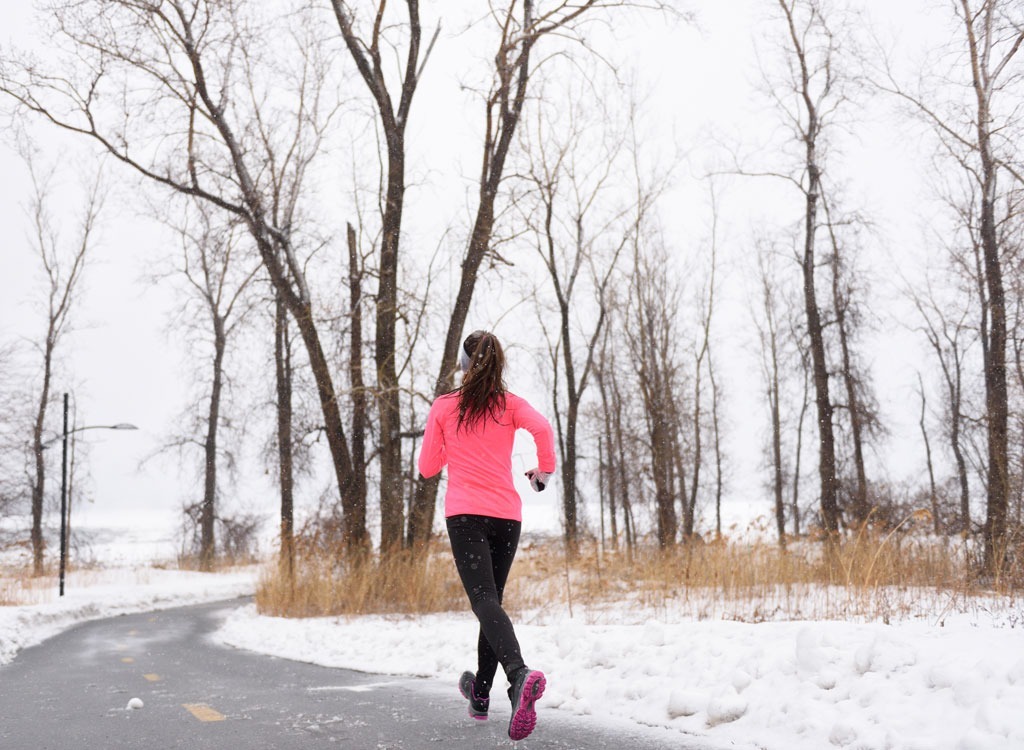 woman running outside in winter