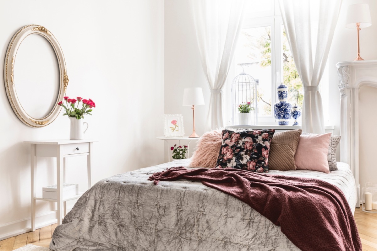 gray bedroom with brown velvet blanket