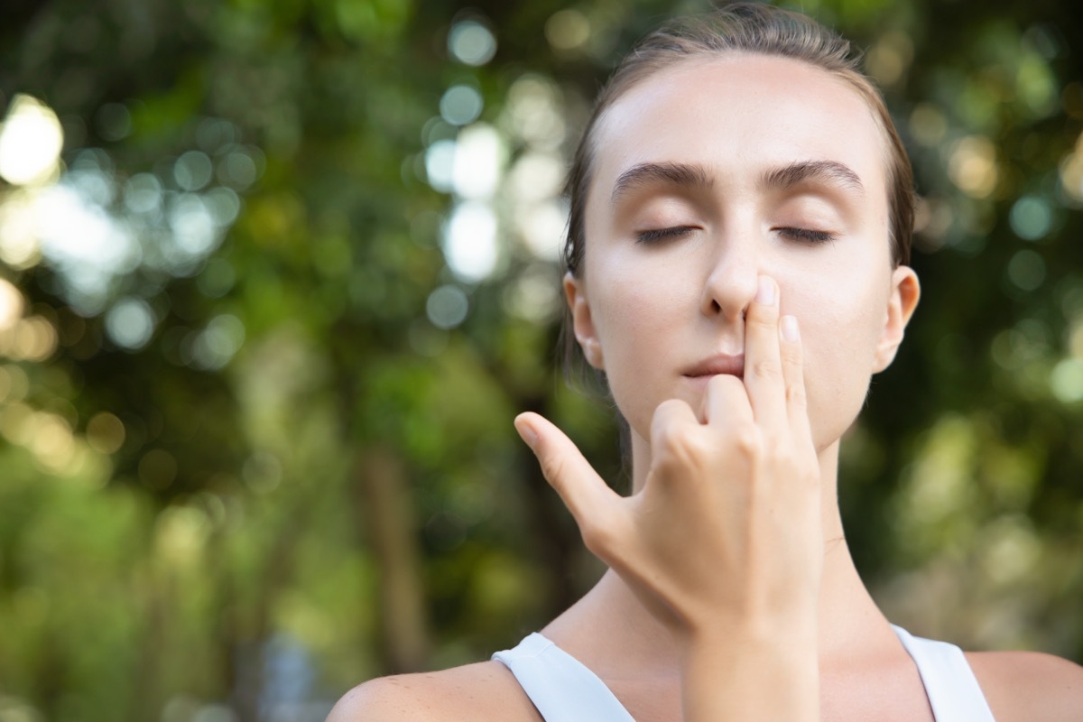 Woman Centering Her Breathing