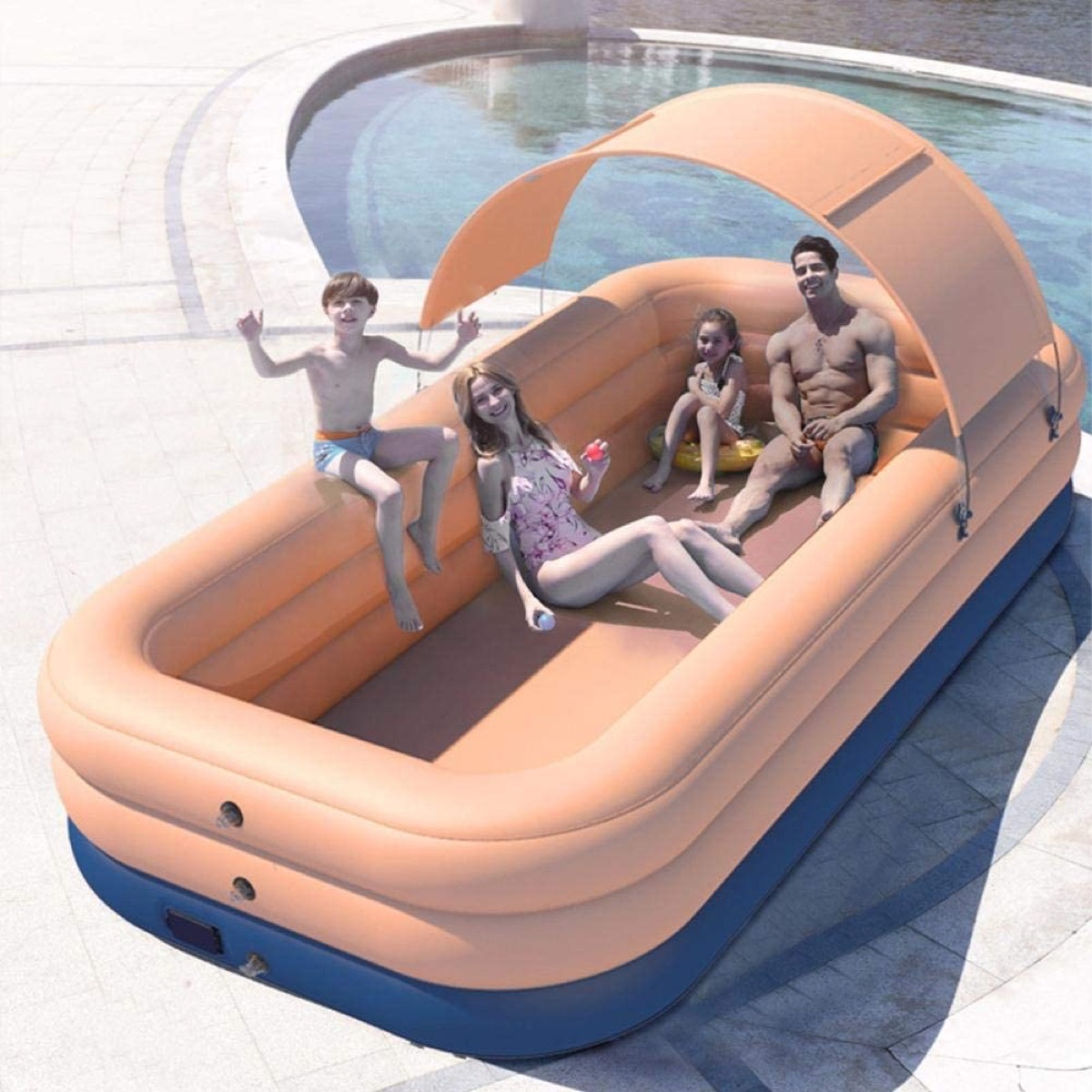 family in covered inflatable pool