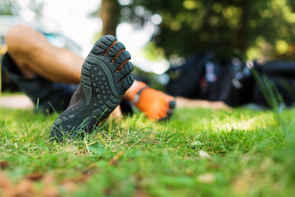 man wearing barefoot shoes.