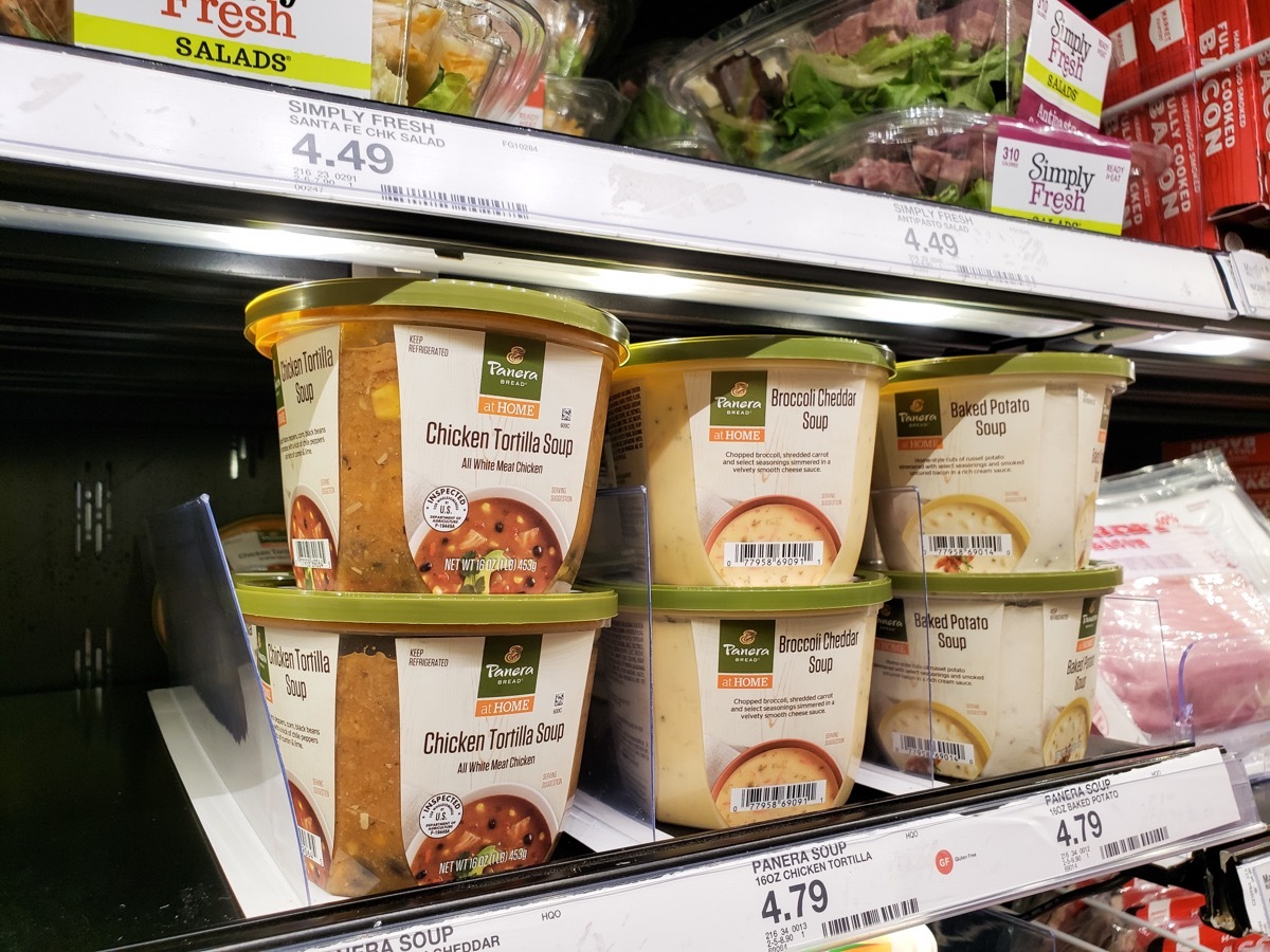 containers of panera at home soup on supermarket shelf