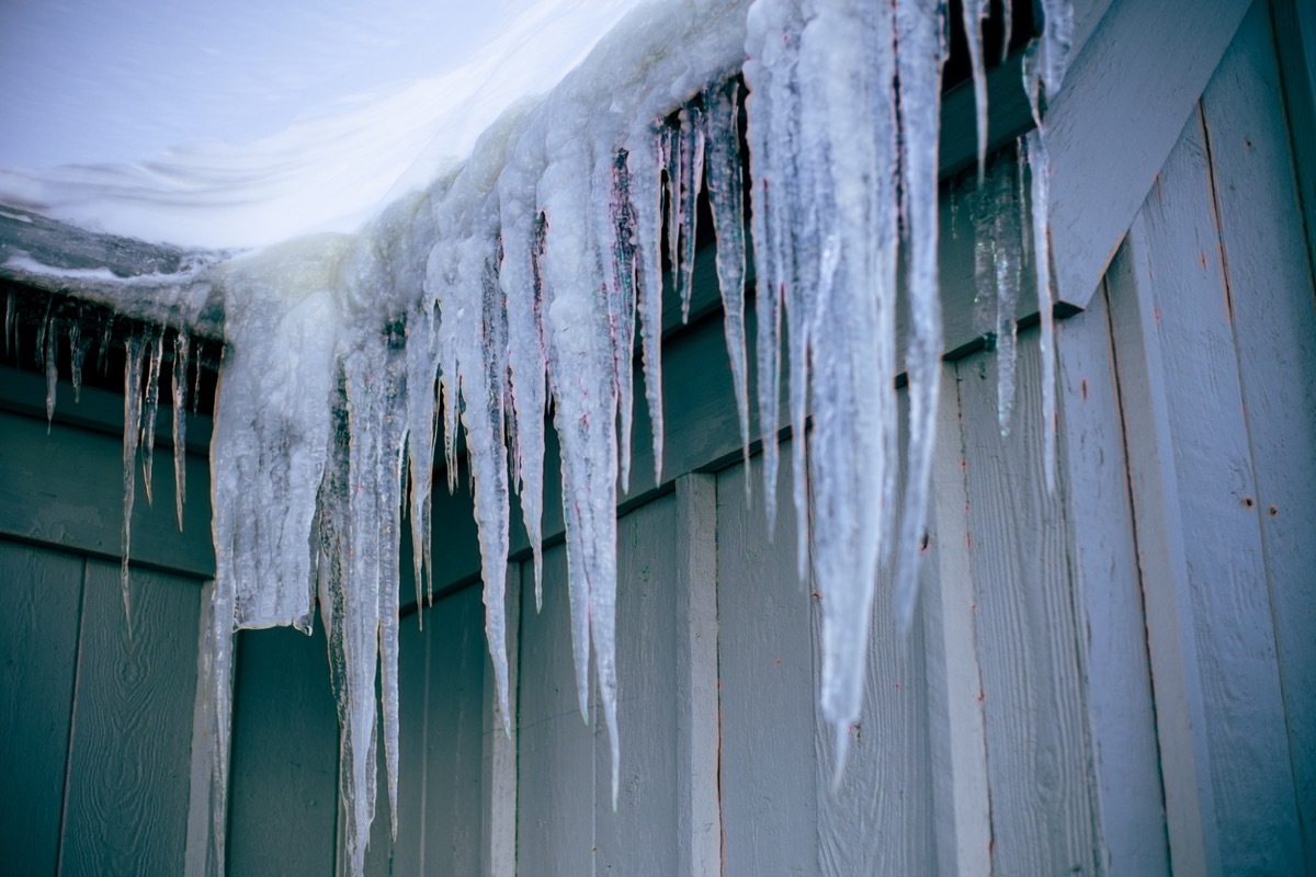 Close ups of icicles hanging off a building roof in the winter season. Shot on Mount Hood in Oregon.